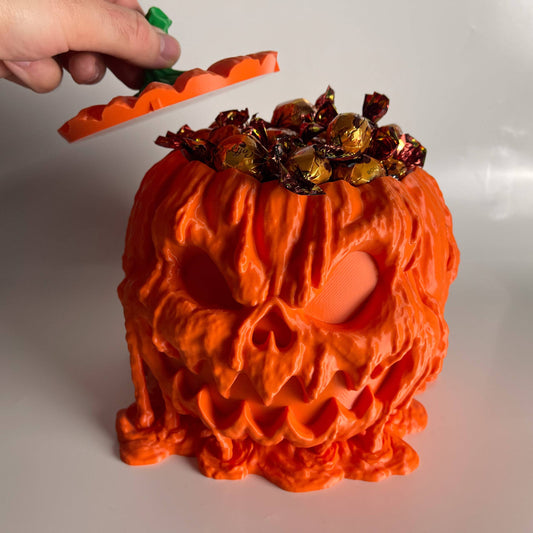 Olvadó tök formájú cukorkatartó