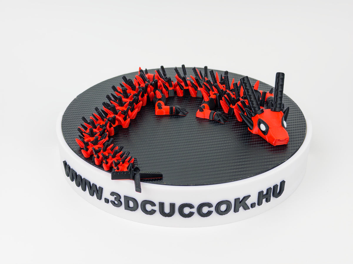 Deadpool inspirálta piros-fekete sárkány fehér szemekkel és kardos részletekkel